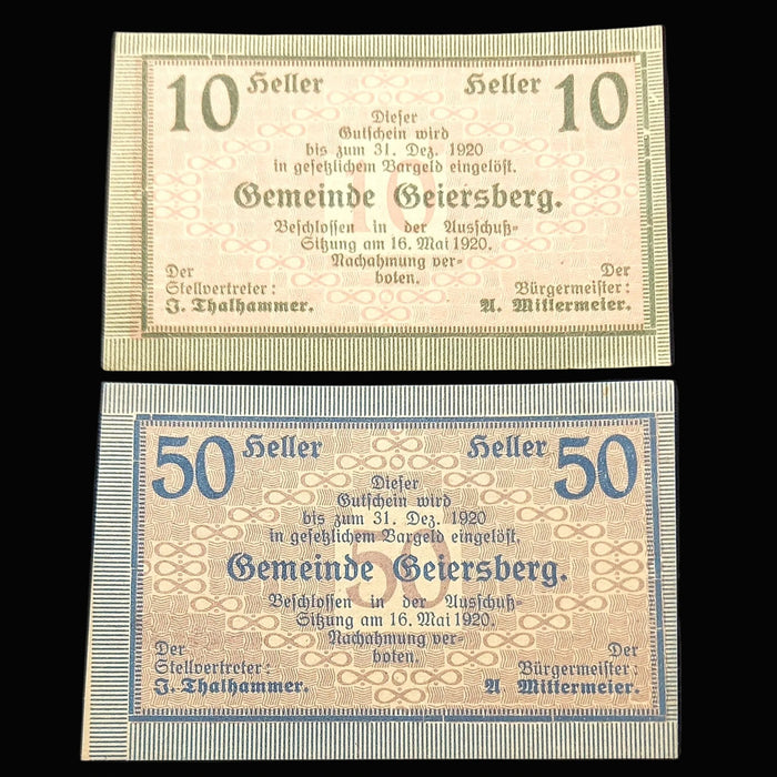 Three vintage banknotes from Gemeinde Geiersberg on a black background
