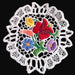 Embroidered doily with flowers on a black background from hungary