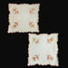 Two brown and beige embroidered square placemats with floral patterns on a dark background from Hungary 1970s vintage