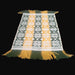 Textile with green, yellow, and white pattern from hungary europe on a black surface