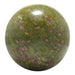 Green and purple ruby fuchsite sphere on a white background