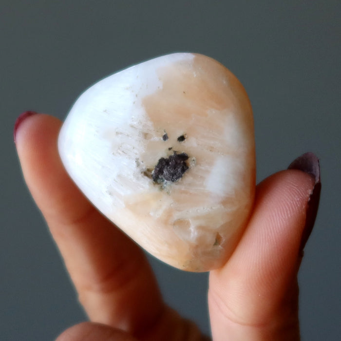 orange scolecite tumbled stone