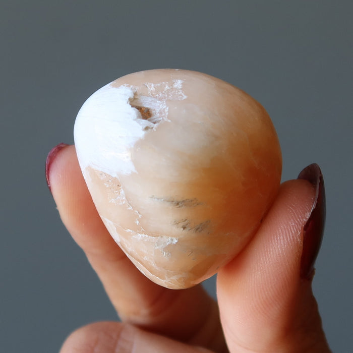 orange scolecite tumbled stone