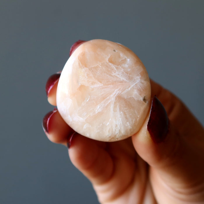 orange scolecite tumbled stone