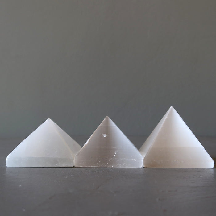 3 white selenite pyramids