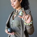 woman holding serpentine stones