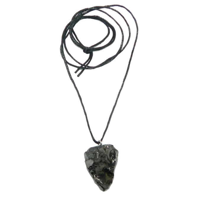 Necklace with a large, dark Shungite stone pendant on a white background