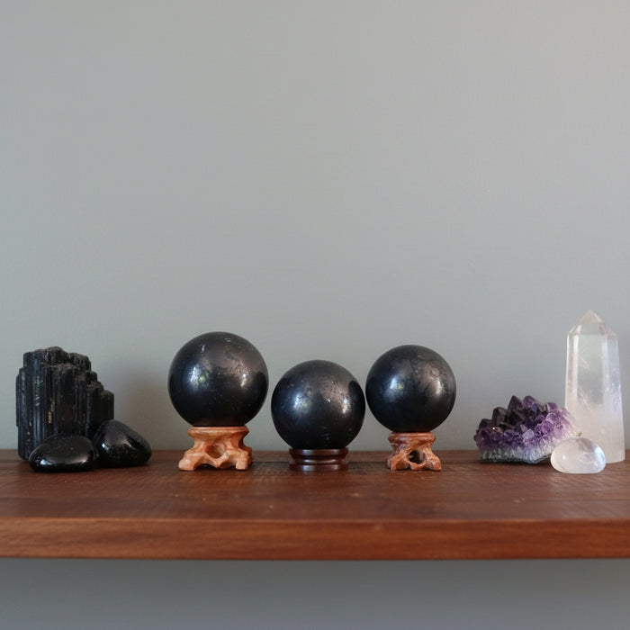 shungite spheres on display stands