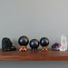 shungite spheres on display stands