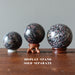 spinel spheres on stands