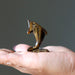 tigers eye dolphin figurine