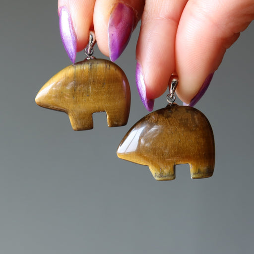 pair of golden tigers eye bear pendants