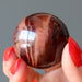 red tigers eye sphere