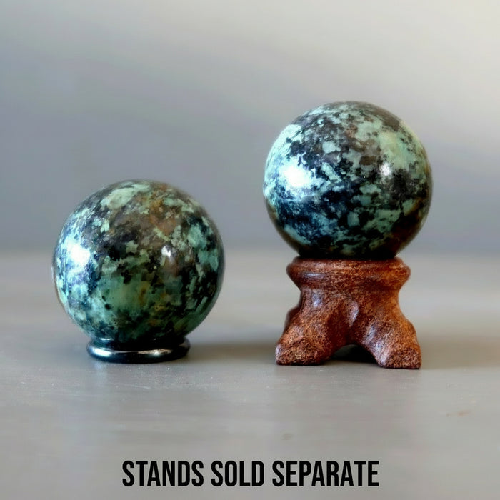 african turquoise spheres on stands