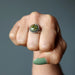 unakite sterling silver ring on finger
