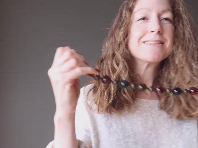 video of golden, blue and red tigers eye on antiqued beaded necklace