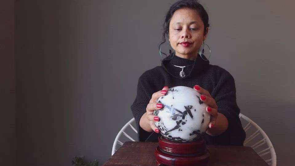video featuring quartz tourmaline sphere