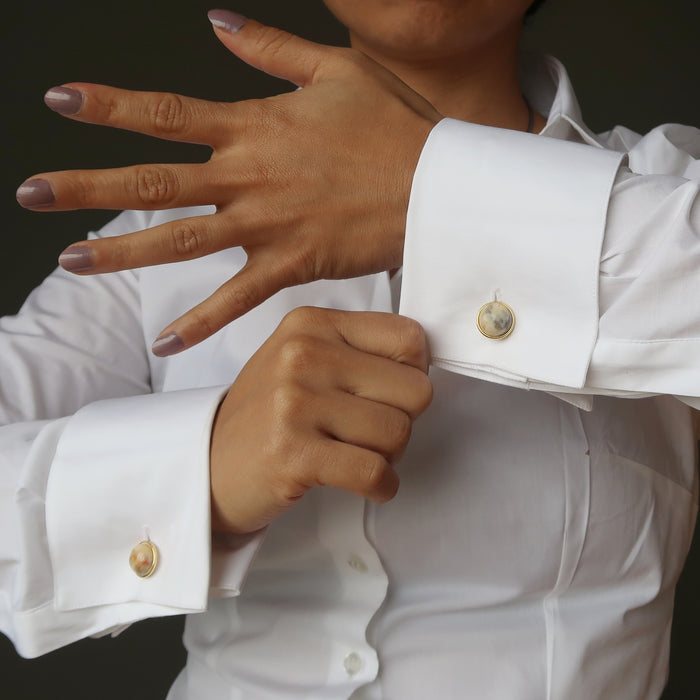 yellow crazy lace agate cufflinks modeled by a lady in french cuff shirt