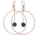 moss agate flower beads hanging in copper hoop earrings