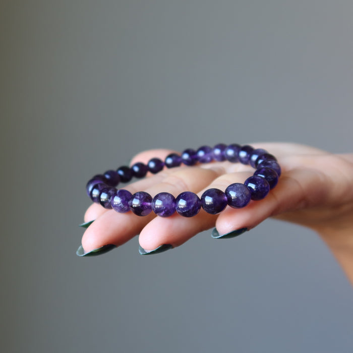 dark amethyst bracelet in hand