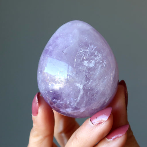 hand holding an Amethyst egg