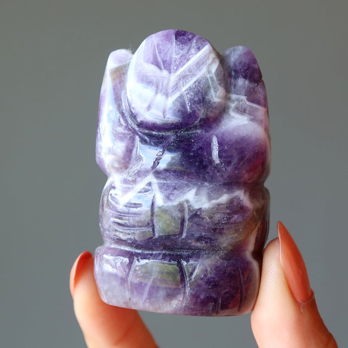 displaying the back of Amethyst purple Ganesh Elephant God 