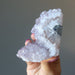 hand holding amethyst geode