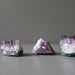 three amethyst geode clusters