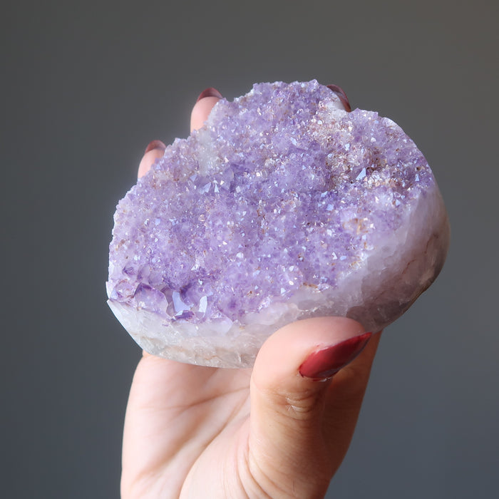 holding 3.0-3.75 Inches violet amethyst heart crystal cluster