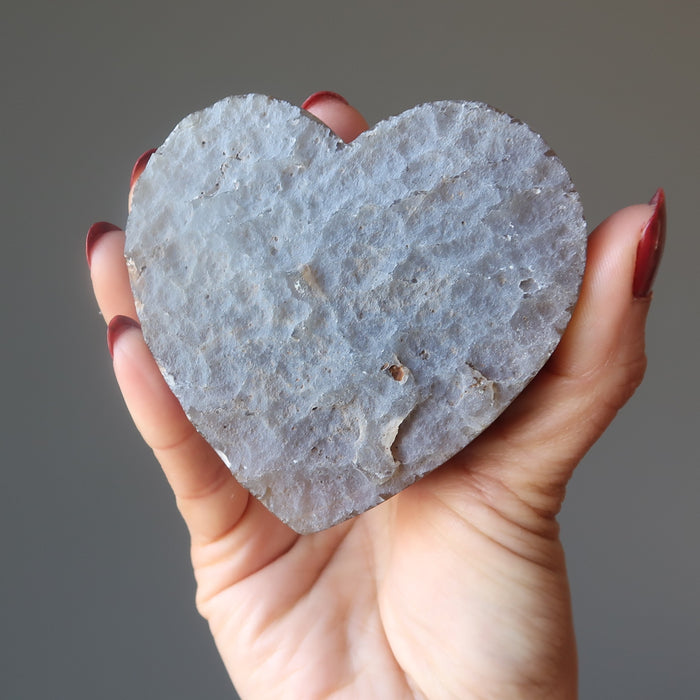 displaying back side of 3.0-3.75 Inches violet amethyst heart crystal cluster