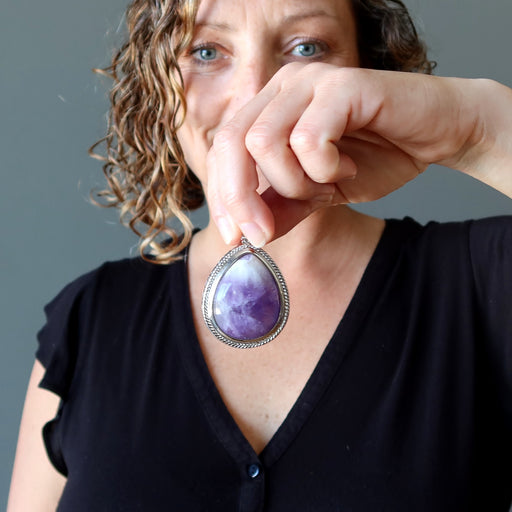 female model holding 2.3 x 1.5 inches Teardrop Purple Amethyst silver framed Pendant 
