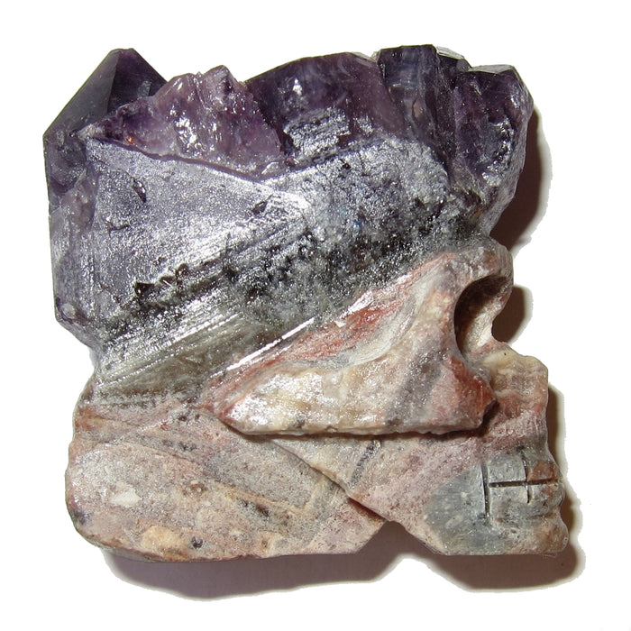 skull carved from an amethyst geode