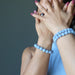 female model wearing blue angelite bracelets