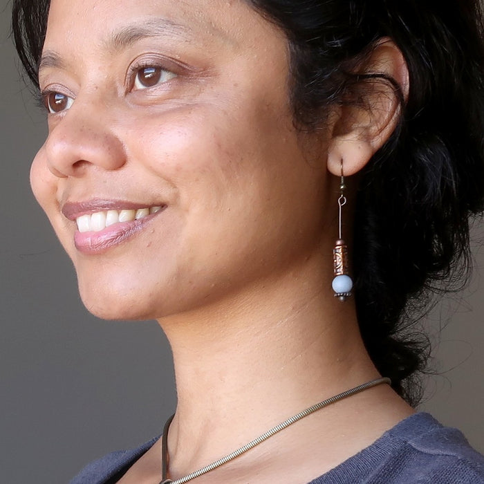 female model wearing angelite earrings