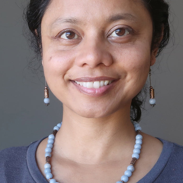 female model wearing angelite earrings