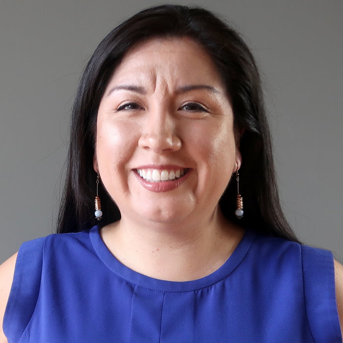 female model wearing angelite earrings