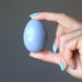 hand holding angelite egg