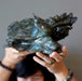 lydia of satin crystals holding a big labradorite dragon turtle carving over her head