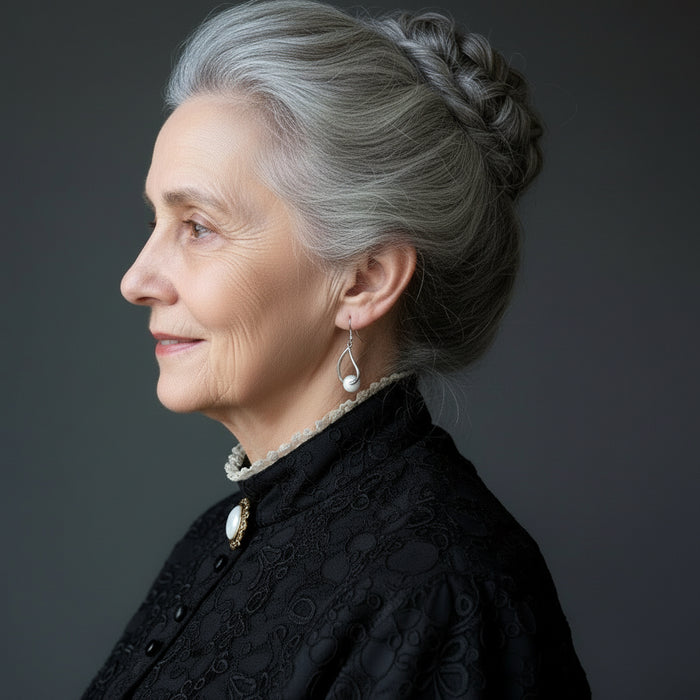 sheila of satin crystals wearing aquamarine earrings