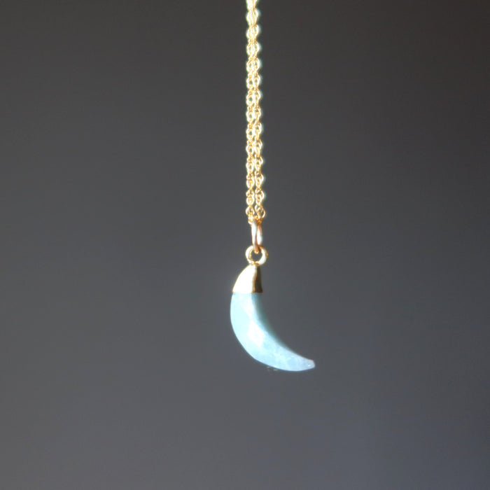 aquamarine crescent moon pendant on gold necklace