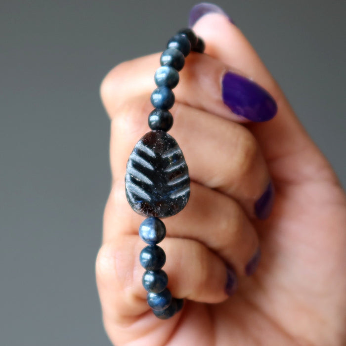 model holding Arfvedsonite Leaf shape and Blue Kyanite Bracelet 