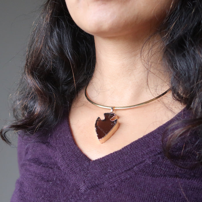 smoky quartz arrowhead necklace on female neck