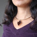 smoky quartz arrowhead necklace on female neck