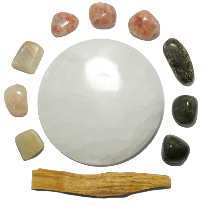moonstone, sunstone, labradorite tumbled stones with selenite circle and palo santo stick