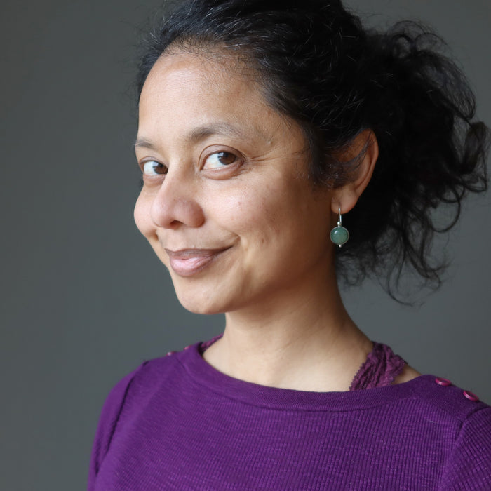 female wearing green aventurine sterling silver earrings