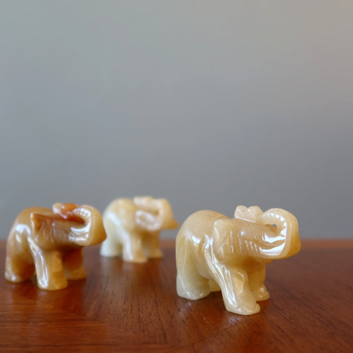 three Golden Aventurine Elephant Figurines