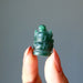 holding green aventurine ganesh