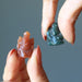 green and orange aventurine ganesh on each hand