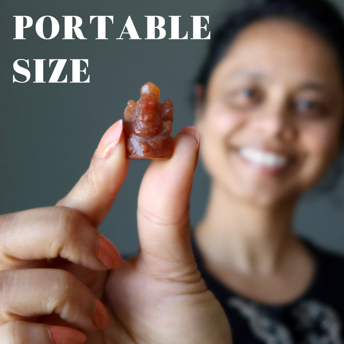 sheila of satin crystals holding portable size orange aventurine ganesh elephant god