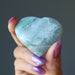 hand holding aventurine heart
